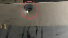 ৫০ লাখ টাকা চাঁদা না পেয়ে প্রবাসী ব্যবসায়ীর ১১ তলা ভবনের গেটে গুলি
