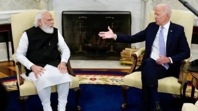 নরেন্দ্র মোদি ও জো বাইডেন। ফাইল ছবি: রয়টার্স
