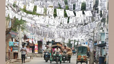 নির্বাচনি পোস্টারে ছেয়ে গেছে রাজশাহী সিটি করপোরেশন