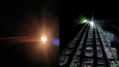 ব্রাহ্মণবাড়িয়া স্টেশনে দাঁড়ানো মহানগর এক্সপ্রেস ট্রেন ও আগুনের ছবি