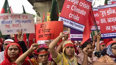 স্লোগান, মিছিলের মধ্য দিয়ে শ্রমিকদের মে দিবস পালন (ছবি: নাসিরুল ইসলাম)