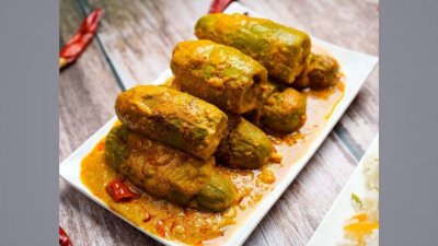 ভিন্ন স্বাদের ঘরোয়া রেসিপি পটোলের দোলমায় মাছের ডিম