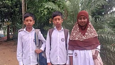 যমজ তিন ভাইবোন
