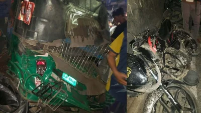 লরির চাপায় দুমড়েমুচড়ে যাওয়া গাড়ি