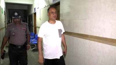 আটক শেরপুর জেলা পাসপোর্ট অফিসের সহকারী পরিচালক রুস্তম আলী