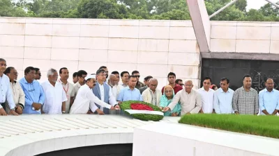বাংলাদেশ জাতীয়তাবাদী দল বিএনপির ৪৮তম প্রতিষ্ঠাবার্ষিকী উপলক্ষে শেরে বাংলা নগরে দলের প্রতিষ্ঠাতা জিয়াউর রহমান ও সাবেক প্রধানমন্ত্রী খালেদা জিয়ার সমাধিতে শ্রদ্ধা নিবেদন করছেন দলের চেয়ারম্যান ও প্রধানমন্ত্রী তারেক রহমান