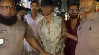 পুলিশের হেফাজতে আটক ব্যক্তি