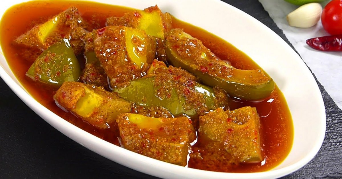 কাঁচা আমের টক আচার বানানোর রেসিপি জেনে নিন