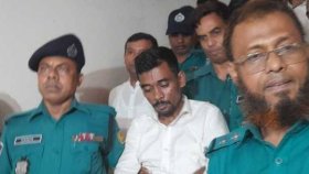 আত্মসমর্পণের পর স্ত্রীসহ কারাগারে মিল্টন সমাদ্দার