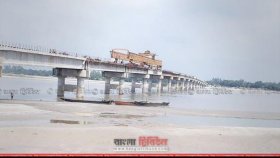 ধরলায় অজ্ঞাত ব্যক্তির লাশ, গলায় পুঁতির মালা