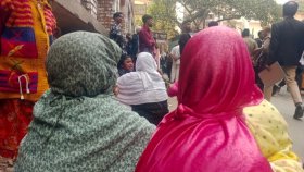 দুধের শিশুকে কোলে নিয়ে স্বামীর জামিনের অপেক্ষায় স্ত্রী
