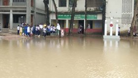 বৃষ্টি হলেই বিদ্যালয়ের মাঠে জমে পানি, শিশুশিক্ষার্থীদের দুর্ভোগ