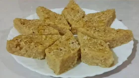 নলেন গুড়ের মিষ্টি স্বাদে চন্দন কাঠ পিঠা