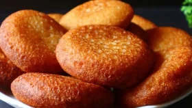 পাউরুটি দিয়েই তৈরি করুন মুচমুচে পোয়া পিঠা
