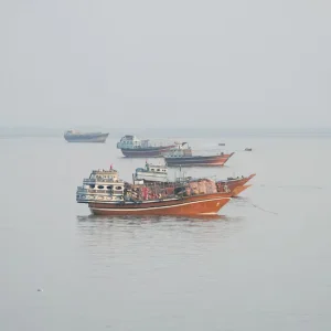 Iran's Revolutionary Guard says four tankers caught fire and exploded in the Strait of Hormuz