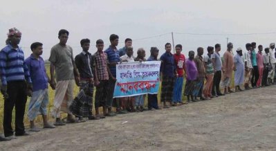 নাটোরে পাকা ধান নিয়ে বিপাকে কৃষকরা