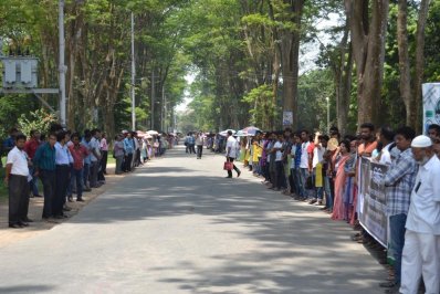 অধ্যাপক রেজাউল হত্যার প্রতিবাদে রাবিতে মানববন্ধন-২