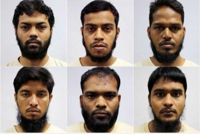 ছবিতে উপরে বাম থেকে সন্দেহভাজন হোতা রহমান মিজানুর, মিয়া রুবেল, নুরুল ইসলাম সওদাগর, সোহেল হাওলাদার, জামান দৌলত ও মামুন লিয়াকত আলী
