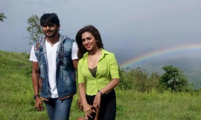 পাহাড়ে শুভ-ফারিয়া। পেছনে রংধনু।