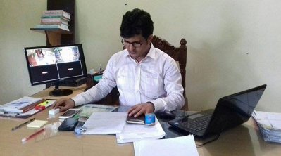 এসিল্যান্ড ওলিউজ্জামান