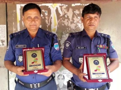 এসআই শুকুমার কুণ্ডু ও নিরব হোসেন