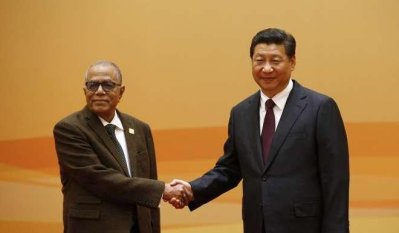 ২০১৪ সালে চীন সফরে রাষ্ট্রপতি আবদুল হামিদকে উষ্ণ অভ্যর্থনা জানান চীনা প্রেসিডেন্ট শি জিনপিং।