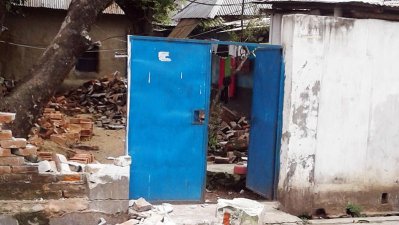 প্রাচীর ভেঙে বাড়ি দখলের চেষ্টা