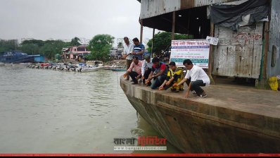 নদীতে পুষ্পার্ঘ্য অর্পণ