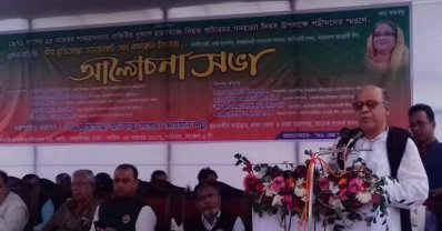 ঘাটারচর গণহত্যা দিবস উপলক্ষে এক আলোচনা সভায় বক্তব্য রাখছেন খাদ্যমন্ত্রী অ্যাডভোকেট কামরুল ইসলাম