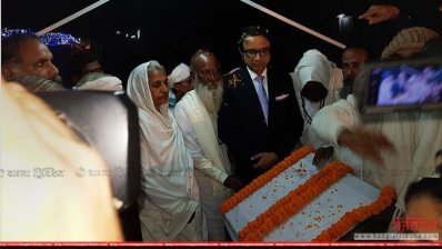 পুষ্পধাম আশ্রমের উদ্বোধন করছেন জেলা প্রসাশক