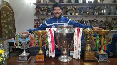 আবাহনীর জেতা সব ট্রফির সামনে আতিকুর রহমান