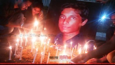 বাবু স্মরণে মোমবাতি প্রজ্বালন