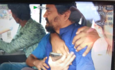 আটকের পর ইমরান এইচ সরকার (ছবি সংগৃহীত)