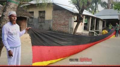 গত বিশ্বকাপে আলোড়ন তুলেছিলেন লম্বা জার্মান পতাকা বানিয়ে