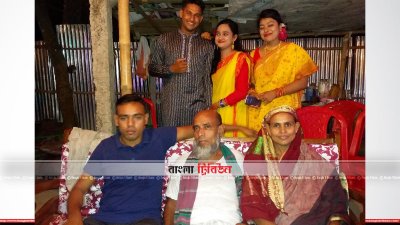 পরিবারের সঙ্গে নীল গেঞ্জিপরা শামসুল