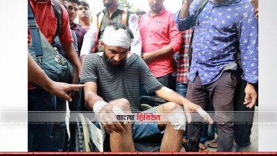 বেধড়ক মারধরের শিকার এপির ফটোসংবাদিক এ এম আহাদ