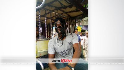 ঠাকুরগাঁওয়ে যাত্রীর মুখমণ্ডলে মোবিল লাগালো শ্রমিকরা