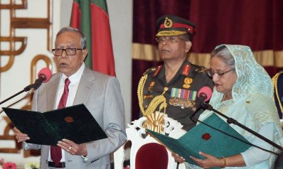 প্রধানমন্ত্রী হিসেবে শেখ হাসিনাকে শপথ পাঠ করান রাষ্ট্রপতি মো. আবদুল হামিদ (ছবি: ফোকাস বাংলা)