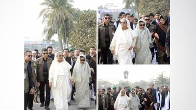হেলিপ্যাডের দিকে হেঁটে আসেন প্রধানমন্ত্রী ও তার বোন। (ছবি: আমরাফ সিদ্দিকী বিটুর ফেসবুক থেকে নেওয়া)