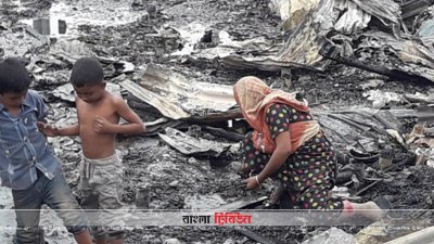 যদি কিছু বেঁচে থাকে সেই আশায় ছাই সরিয়ে চলছে সন্ধান