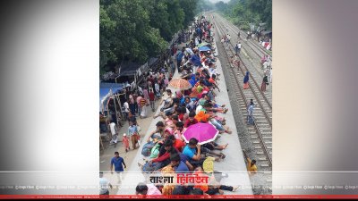 উত্তরাঞ্চলের ট্রেনের ছাদেও উপচে পড়া ভিড়