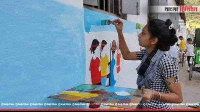 দেয়ালে ছবি আঁকা চলছে