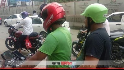 ভাড়ায় চালিত মোটরসাইকেলে একটি হেলমেট একাধিক যাত্রী ব্যবহার করেন