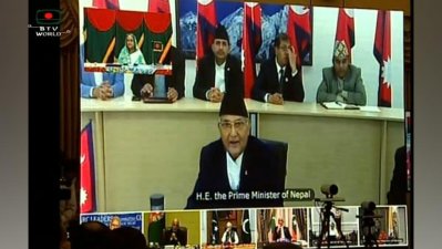 করোনা প্রতিরোধ নিয়ে ভিডিও কনফারেন্সে বক্তব্য রাখছেন নেপালের প্রধানমন্ত্রী। ইনসেটে সার্কভুক্ত অপর দেশগুলোর নেতারা। (ছবি: টিভি থেকে)
