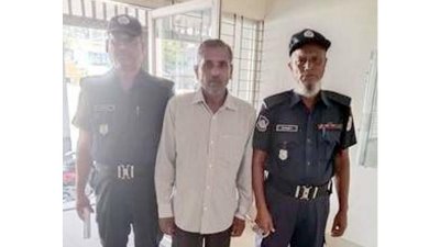 পুলিশের হাতে আটক মো. হেমায়েত হাওলাদার