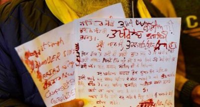নিজেদের রক্তে মোদিকে চিঠি লিখলেন ভারতের কৃষকরা