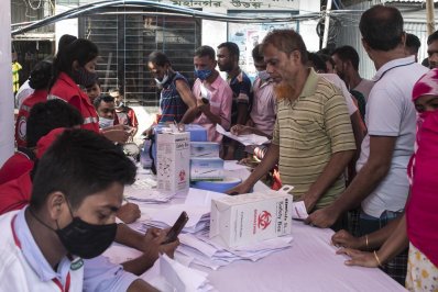 রাজধানীতে বস্তিবাসীর টিকা দেওয়া শুরু (ফটোস্টোরি)