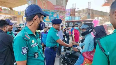 নিরাপদ সড়ক দিবসে জিএমপির রজনীগন্ধা বিতরণ