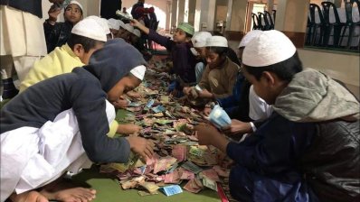 বাক্সগুলো খুলে গণনার জন্য ২০টি বস্তায় টাকা আনা হয়েছে