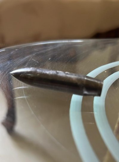 বাসার ভেতরে চলে আসা মেশিনগানের বুলেট